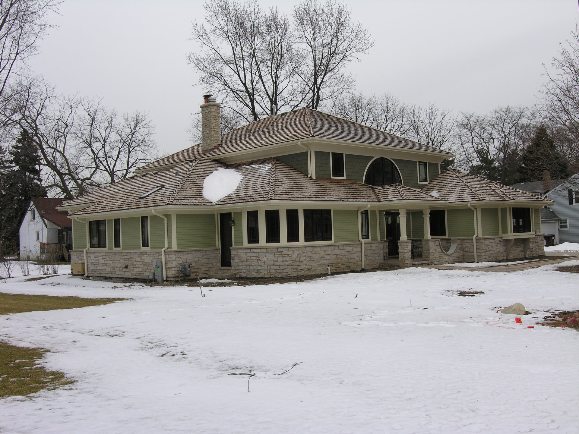 Rear and side exterior of Zeiler Construction custom home in Palos Heights
