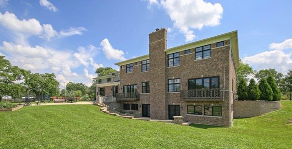 Custom brick two-story home built by Zeiler Construction, front exterior